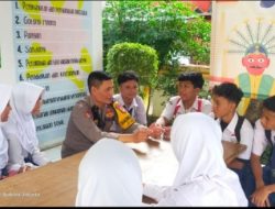 Bhabinkamtibmas Kelurahan Duri Kepa Tanamkan Nilai Disiplin dan Anti Kekerasan Melalui Police Goes To School di SMPN 191